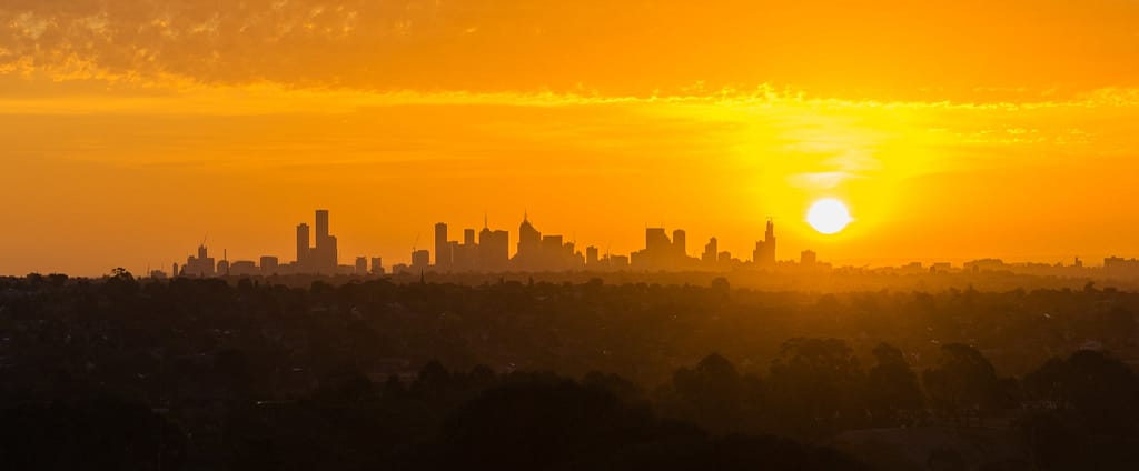 View of Melbourne cityscape at beautiful orange sunset