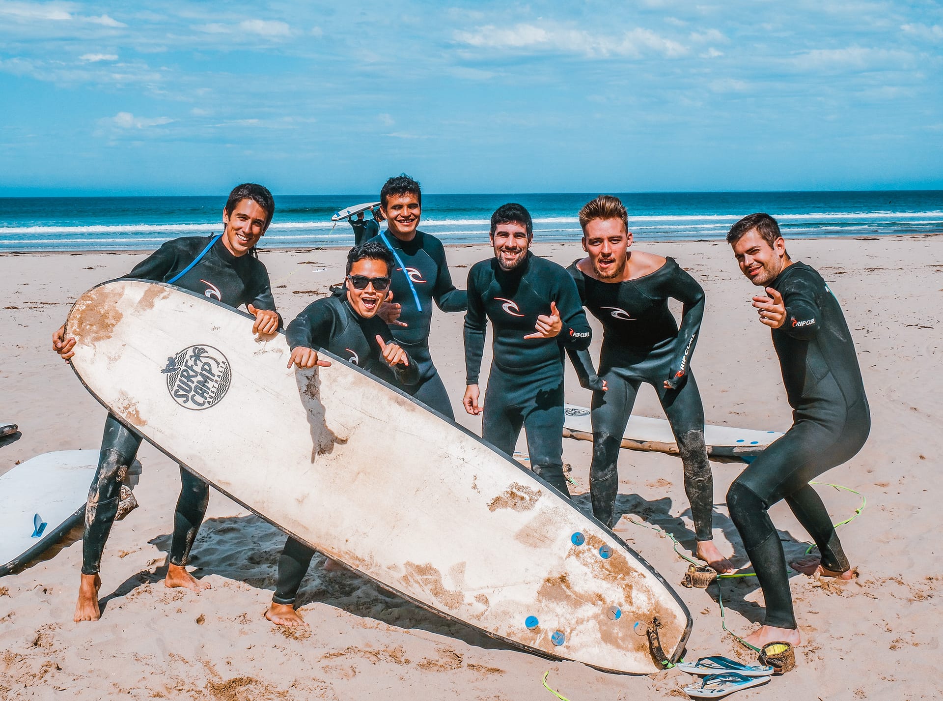 Group of Friends Surfing