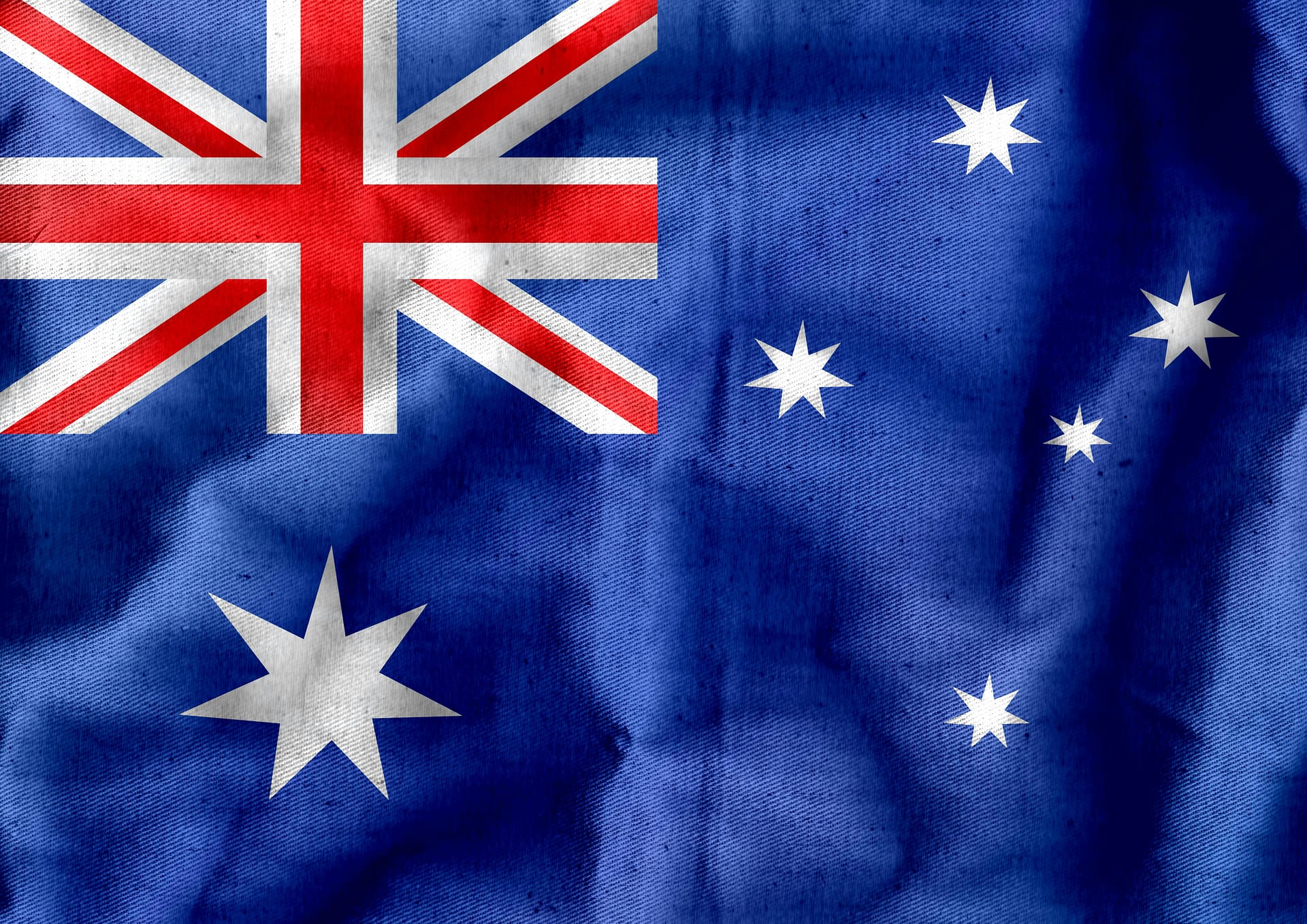 Bandera australiana, con la estrella de la Commonwealth, una estrella blanca de siete puntas que simboliza los seis estados y el Territorio del Norte